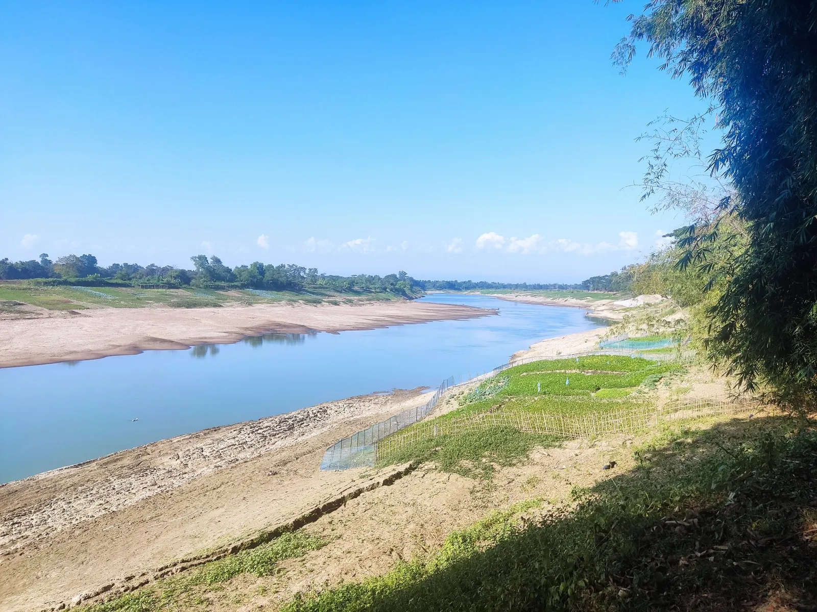 The Surma River winding between sandy banks in the dry season